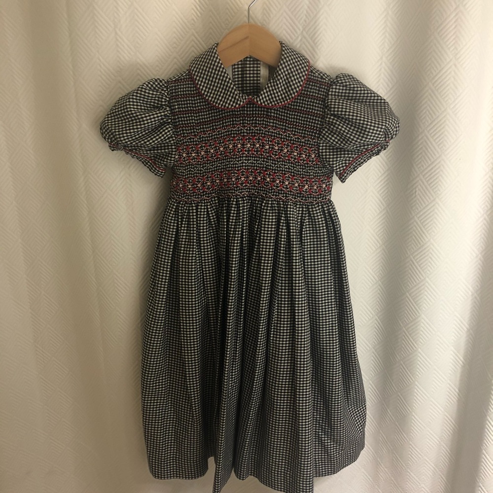 Boutique black and white smocked dress with red